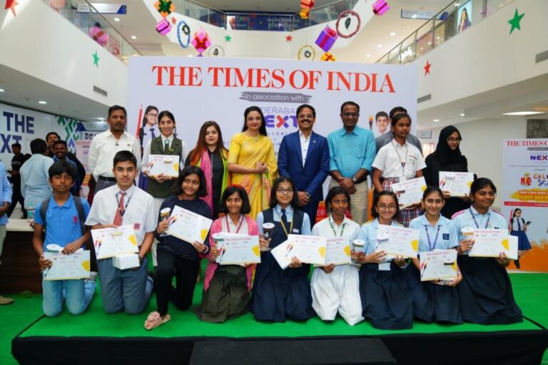 Winners of Times NIE Colour Splash posing with the dignitaries